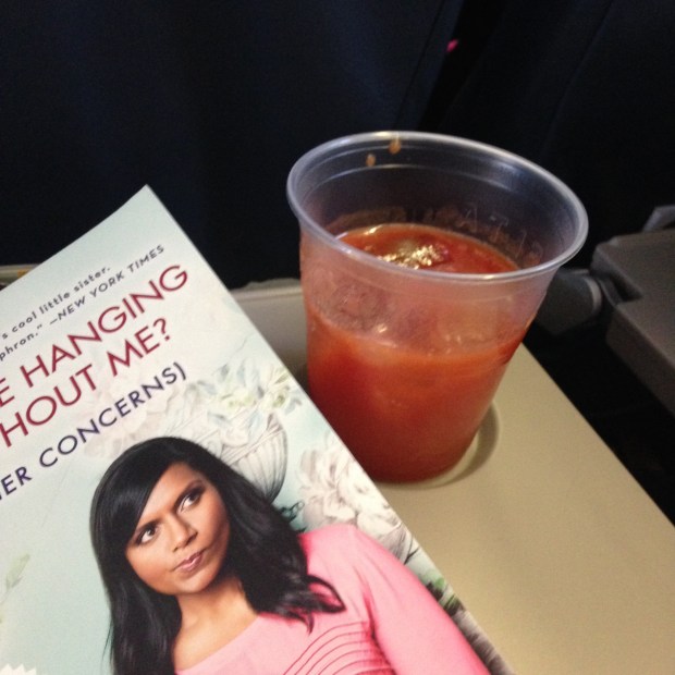 Reading and Tomato Juice on the flight